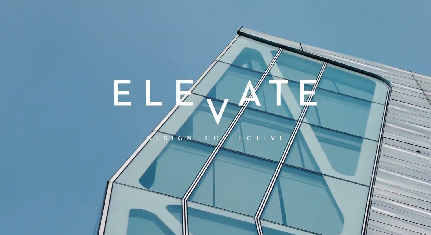 Elevate Design logo over building.